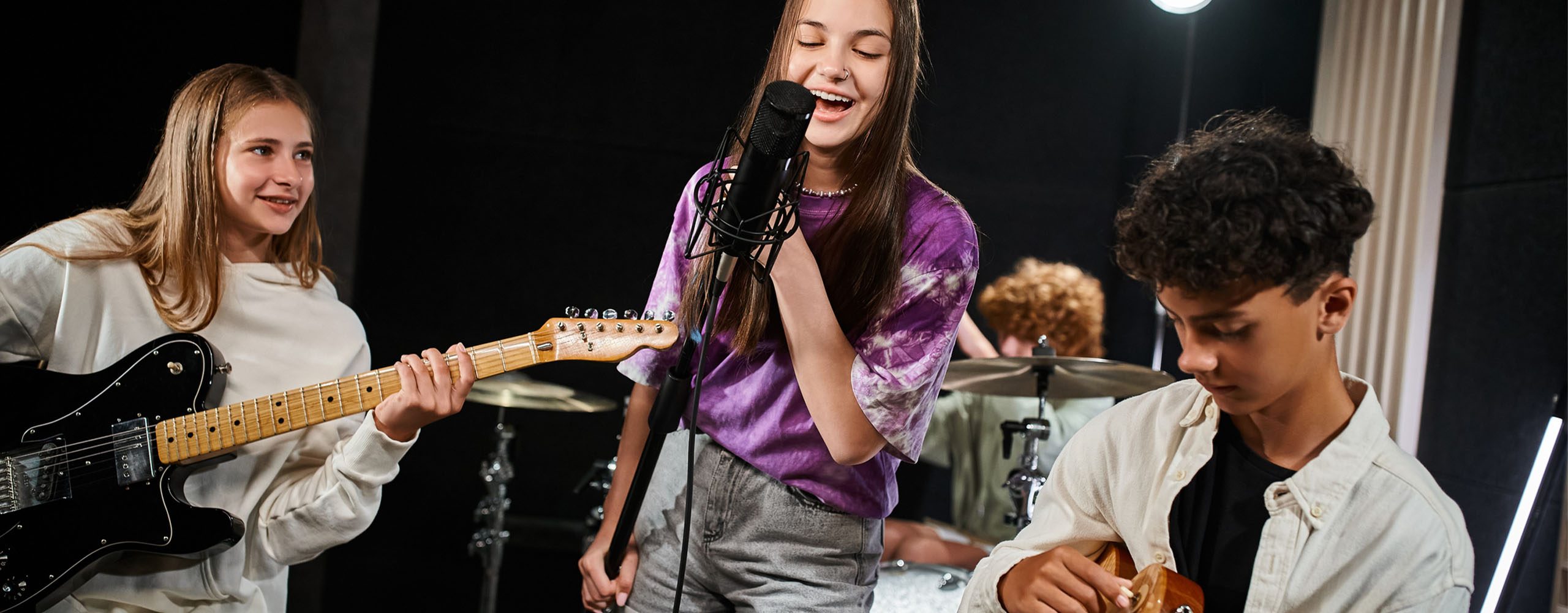 Music - Kids 2560 x 1000 youth band performing including guitar player, drummer and singer