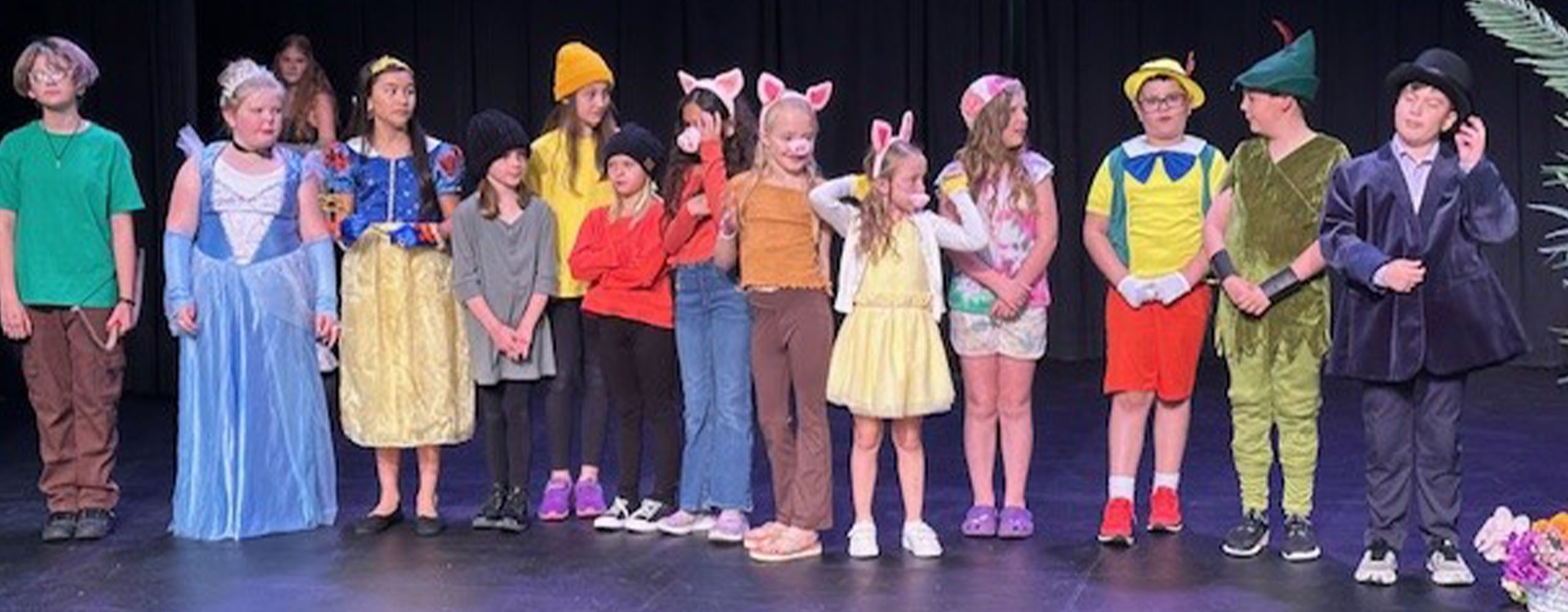 Theater Kids 4 2560 x 1000 young actors on stage in costumes from stage productions of various children's stories