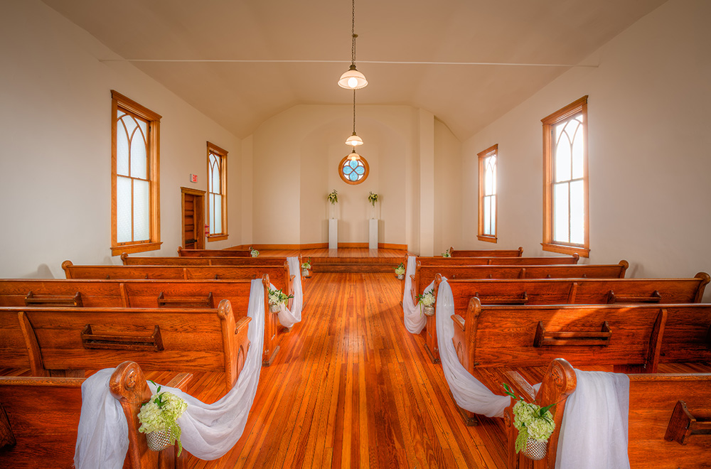 View of the inside of the Chapel decorated for a wedding View of the inside of the Chapel decorated for a wedding
