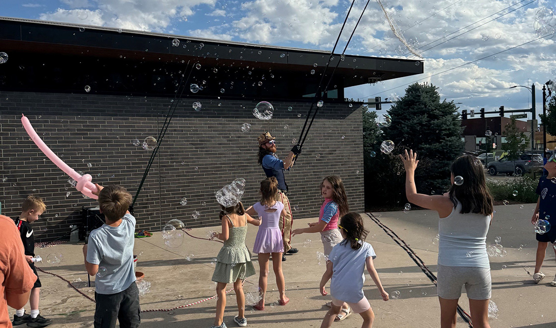 Kids playing with bubbles